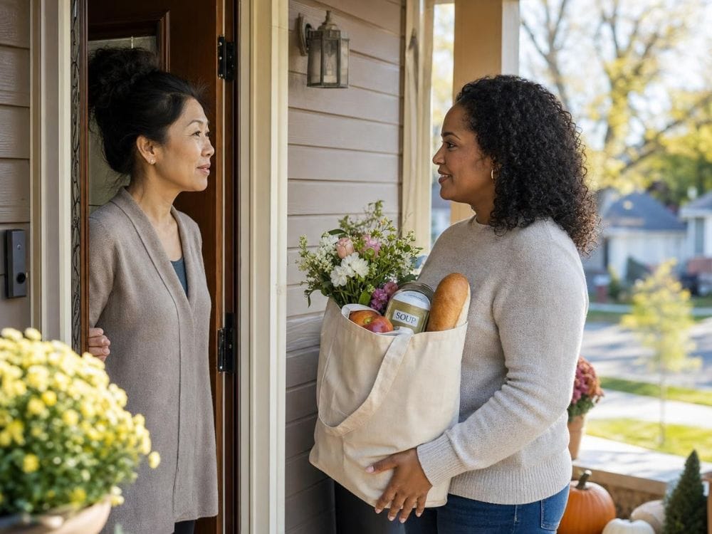  Neighbor delivers groceries and flowers to someone grieving, offering practical support during the first days after a loss.